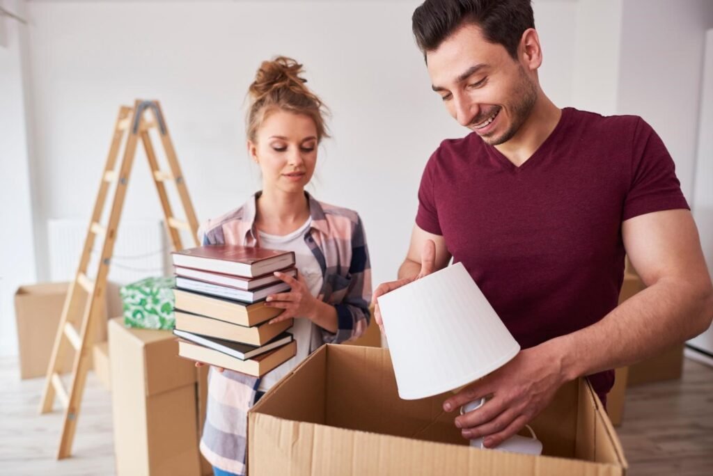Students packing belongings for affordable university moving service