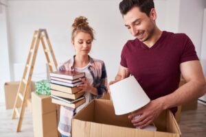 Students packing belongings for affordable university moving service